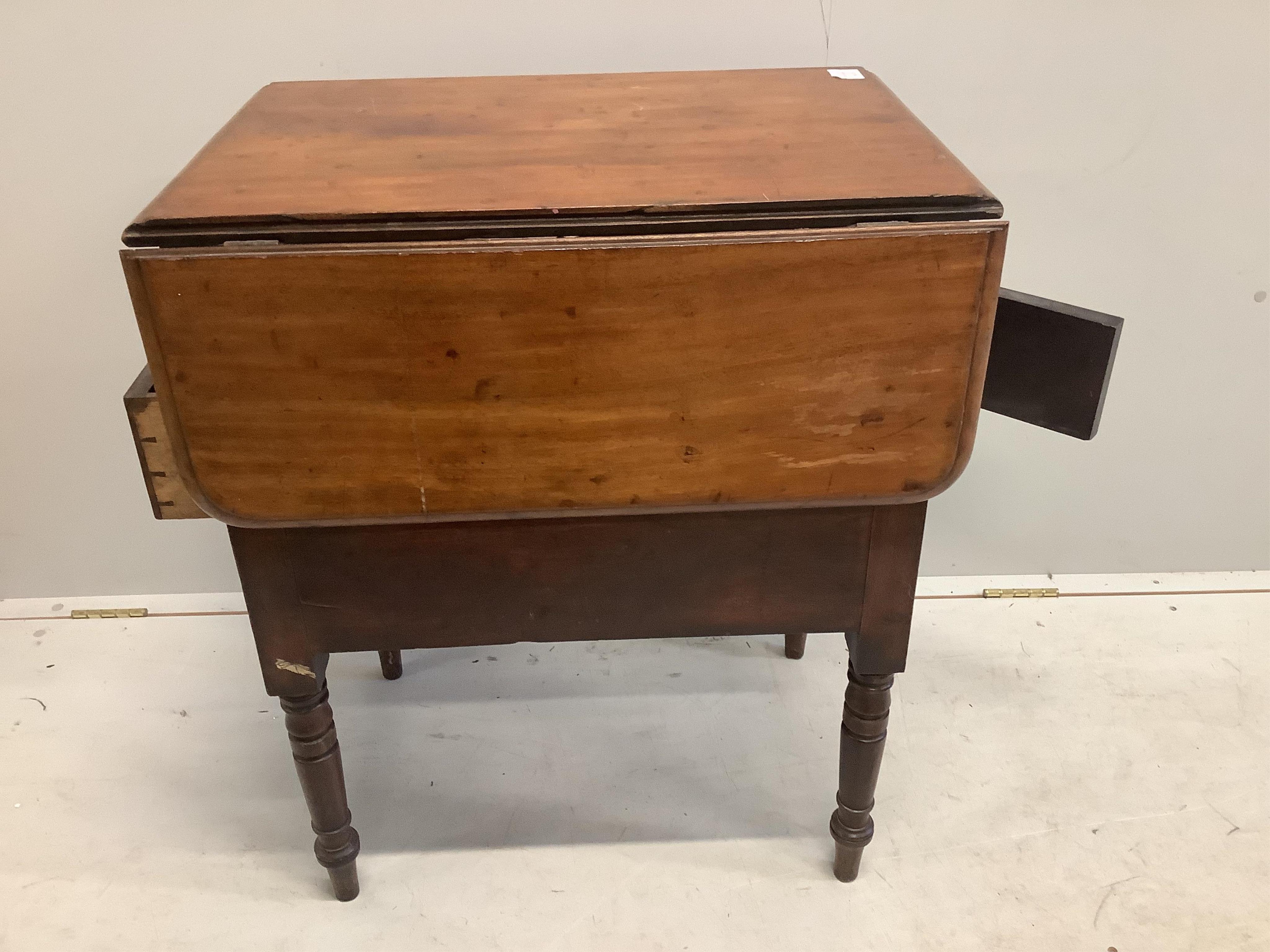 A Victorian mahogany military drop flap table, width 66cm, depth 48cm, height 79cm. Condition - fair